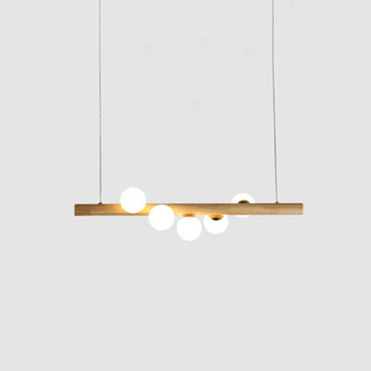 Nordic Linear Wood Island Pendant with Globe Shape Glass Island Light in Beige for Dining Room 5 Wood Clearhalo 'Ceiling Lights' 'Island Lights' Lighting' 2556974