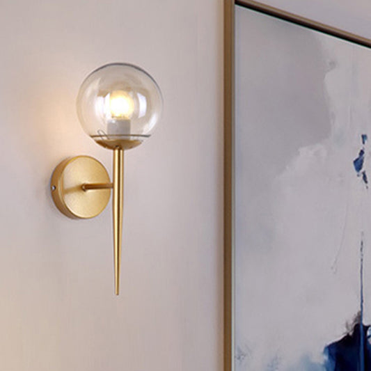 Black/Gold Round Wall Lighting Modern Clear Glass 1 Light Bedroom Sconce Light Fixture Gold Clearhalo 'Cast Iron' 'Glass' 'Industrial wall lights' 'Industrial' 'Middle century wall lights' 'Modern' 'Tiffany' 'Traditional wall lights' 'Wall Lamps & Sconces' 'Wall Lights' Lighting' 256078