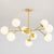 Globe Chandelier Pendant Light Contemporary Style Glass Hanging Light Fixtures for Living Room 9 Gold Clearhalo 'Ceiling Lights' 'Chandeliers' 'Modern Chandeliers' 'Modern' Lighting' 2569452