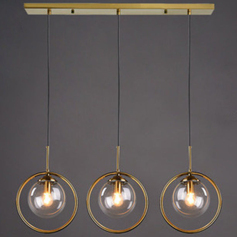Mid-Century Design Globe Hanging Lamp Glass Shade with Metal Ring For Bedroom Clear Linear Clearhalo 'Ceiling Lights' 'Glass shade' 'Glass' 'Modern Pendants' 'Modern' 'Pendant Lights' 'Pendants' Lighting' 2579307