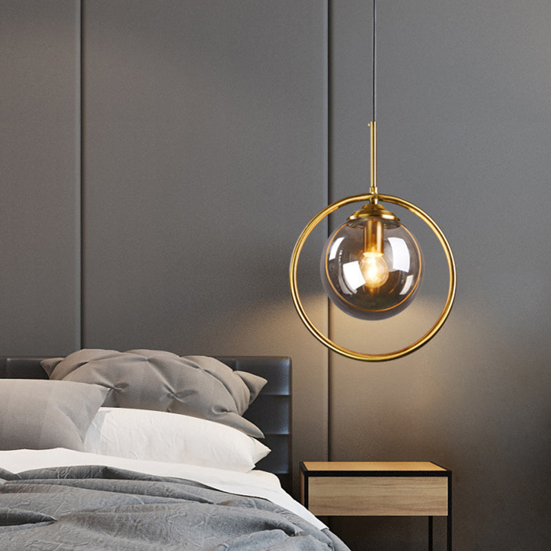 Mid-Century Design Globe Hanging Lamp Glass Shade with Metal Ring For Bedroom Clearhalo 'Ceiling Lights' 'Glass shade' 'Glass' 'Modern Pendants' 'Modern' 'Pendant Lights' 'Pendants' Lighting' 2579308