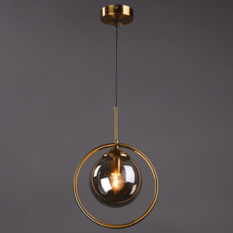 Mid-Century Design Globe Hanging Lamp Glass Shade with Metal Ring For Bedroom Clearhalo 'Ceiling Lights' 'Glass shade' 'Glass' 'Modern Pendants' 'Modern' 'Pendant Lights' 'Pendants' Lighting' 2579313