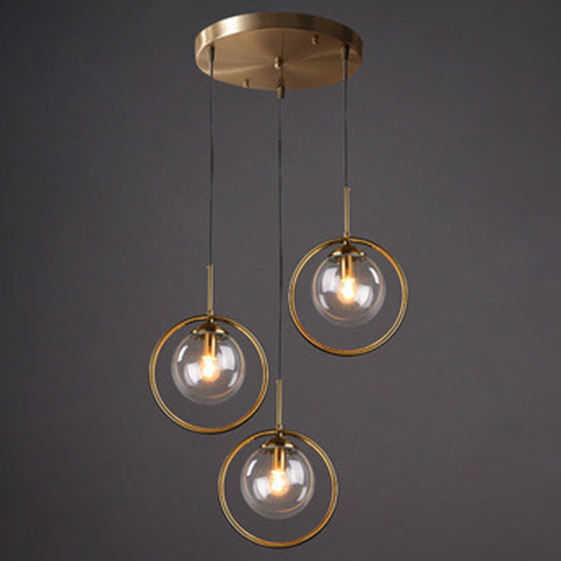 Mid-Century Design Globe Hanging Lamp Glass Shade with Metal Ring For Bedroom Clearhalo 'Ceiling Lights' 'Glass shade' 'Glass' 'Modern Pendants' 'Modern' 'Pendant Lights' 'Pendants' Lighting' 2579317