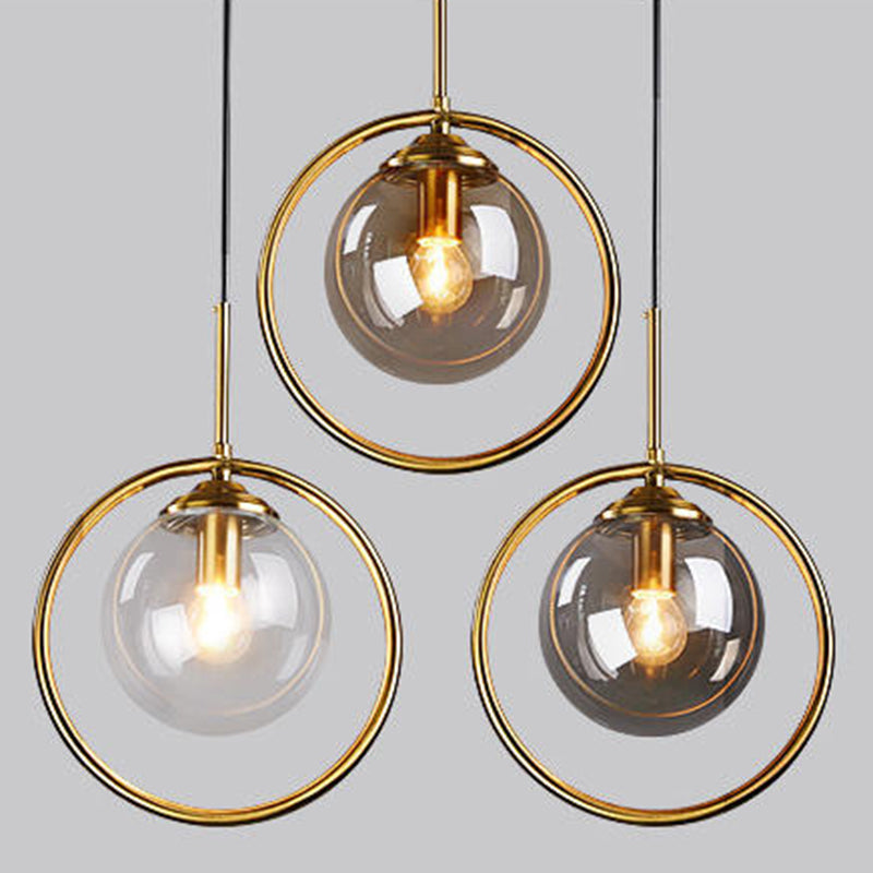 Mid-Century Design Globe Hanging Lamp Glass Shade with Metal Ring For Bedroom Clearhalo 'Ceiling Lights' 'Glass shade' 'Glass' 'Modern Pendants' 'Modern' 'Pendant Lights' 'Pendants' Lighting' 2579320