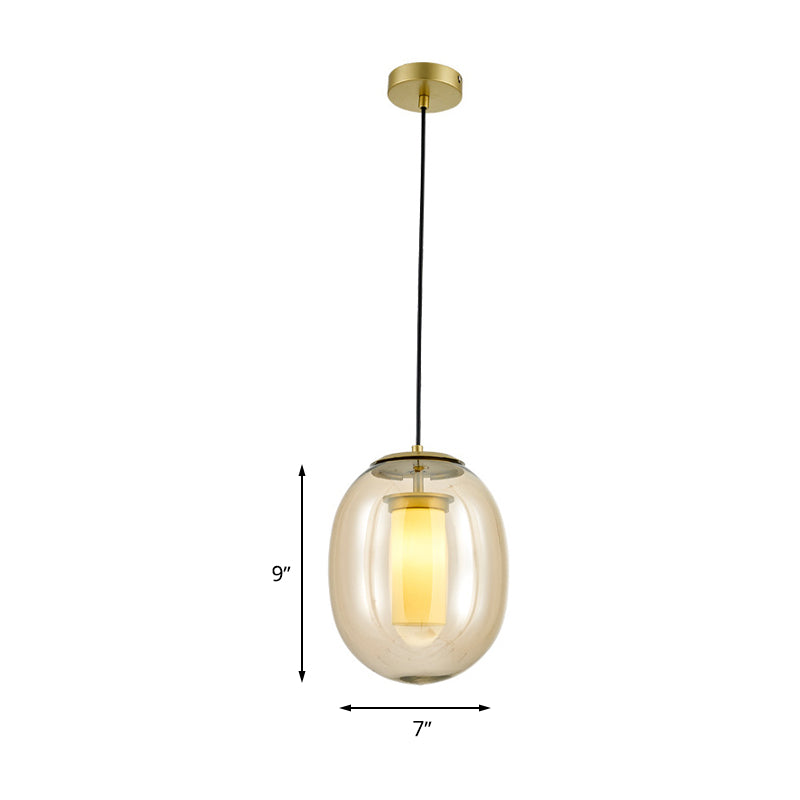 Clear Glass Oval Hanging Lamp Kit Contemporary 7"/8.5" Wide 1 Head Gold Pendant Light for Dining Room Clearhalo 'Ceiling Lights' 'Chandeliers' 'Glass shade' 'Glass' 'Modern Pendants' 'Modern' 'Pendant Lights' 'Pendants' Lighting' 258676