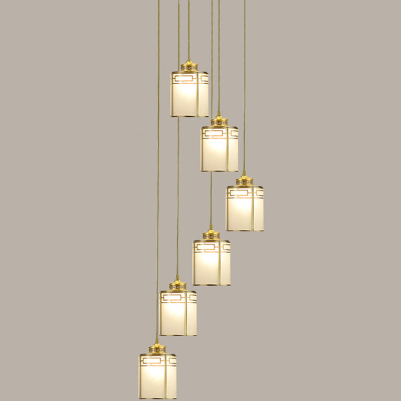 Frosted White Glass Cylindrical Pendant Lamp Modern Brass Multiple Hanging Lights for Duplex House 6 Brass Clearhalo 'Ceiling Lights' 'Glass shade' 'Glass' 'Modern Pendants' 'Modern' 'Pendant Lights' 'Pendants' Lighting' 2592900