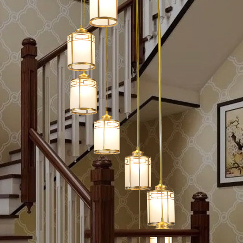 Frosted White Glass Cylindrical Pendant Lamp Modern Brass Multiple Hanging Lights for Duplex House Clearhalo 'Ceiling Lights' 'Glass shade' 'Glass' 'Modern Pendants' 'Modern' 'Pendant Lights' 'Pendants' Lighting' 2592907