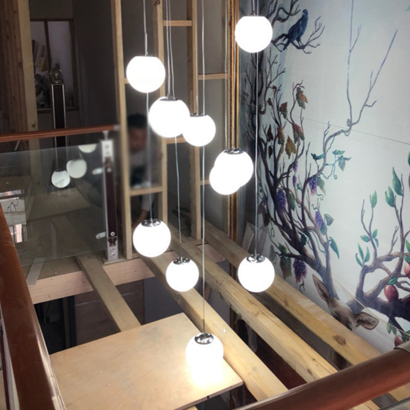 Cream Glass Spherical Multi Pendant Chandelier Simplicity Silver Ceiling Hang Lamp for Lobby Stairs Clearhalo 'Ceiling Lights' 'Modern Pendants' 'Modern' 'Pendant Lights' 'Pendants' Lighting' 2592945