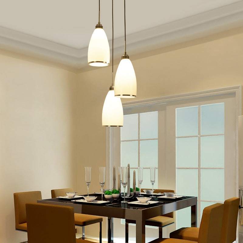 Satin Opal Glass Cluster Bell Pendant Minimalist 3-Light Chrome Suspension Light for Dining Room Clearhalo 'Ceiling Lights' 'Modern Pendants' 'Modern' 'Pendant Lights' 'Pendants' Lighting' 2593017