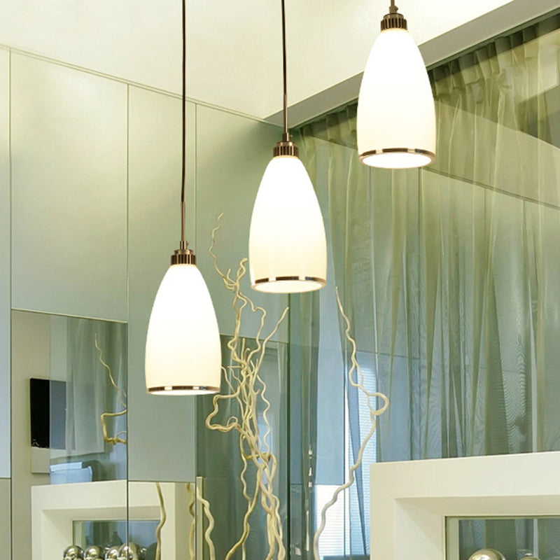 Satin Opal Glass Cluster Bell Pendant Minimalist 3-Light Chrome Suspension Light for Dining Room Clearhalo 'Ceiling Lights' 'Modern Pendants' 'Modern' 'Pendant Lights' 'Pendants' Lighting' 2593018