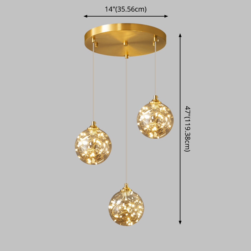 Brass Finish Globe Suspension Lamp Nordic Amber Glass LED Starry Pendant Lighting for Bedroom Clearhalo 'Ceiling Lights' 'Glass shade' 'Glass' 'Modern Pendants' 'Modern' 'Pendant Lights' 'Pendants' Lighting' 2593472