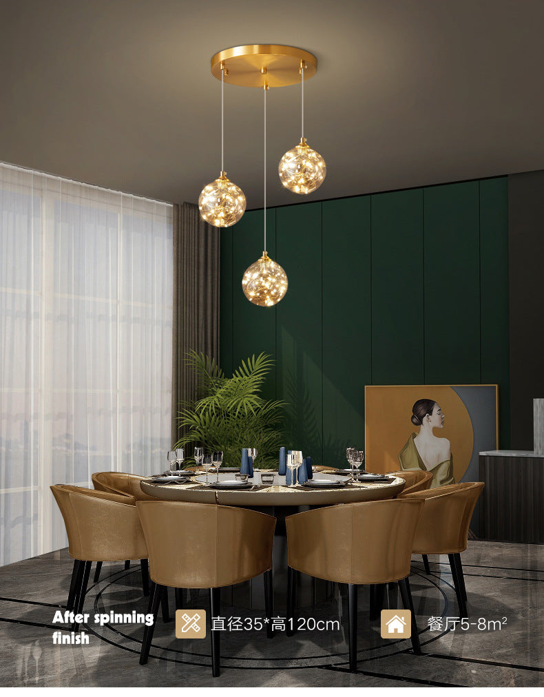 Brass Finish Globe Suspension Lamp Nordic Amber Glass LED Starry Pendant Lighting for Bedroom Clearhalo 'Ceiling Lights' 'Glass shade' 'Glass' 'Modern Pendants' 'Modern' 'Pendant Lights' 'Pendants' Lighting' 2593477