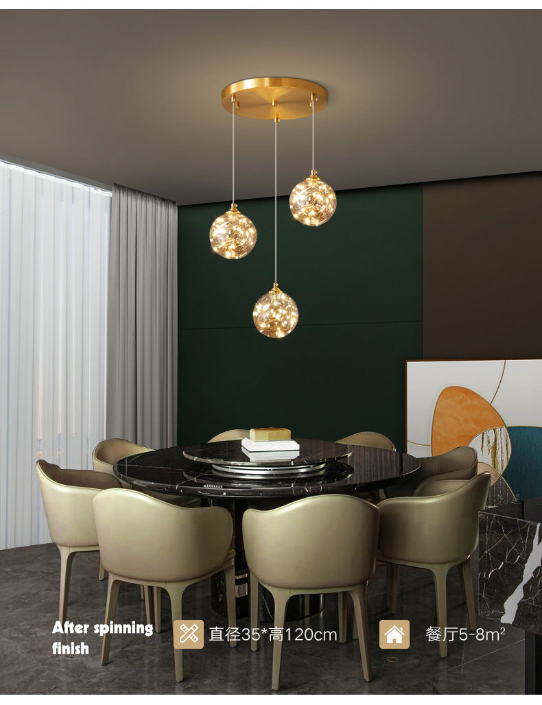 Brass Finish Globe Suspension Lamp Nordic Amber Glass LED Starry Pendant Lighting for Bedroom Clearhalo 'Ceiling Lights' 'Glass shade' 'Glass' 'Modern Pendants' 'Modern' 'Pendant Lights' 'Pendants' Lighting' 2593478