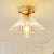 Cone Flush Mount Lamp with Clear Striped Glass Shade Vintage 1 Light Flush Ceiling Light in Brass Brass Clearhalo 'Ceiling Lights' 'Close To Ceiling Lights' 'Close to ceiling' 'Flush mount' 'Industrial Flush Mount' Lighting' 259459