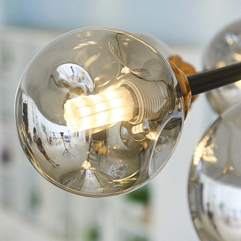 Multi Light Glass Ball Chandelier Light Black Wrought Iron Lamp Body Modern Chic Hanging Light for Living Room Clearhalo 'Ceiling Lights' 'Chandeliers' 'Modern Chandeliers' 'Modern' Lighting' 2600539