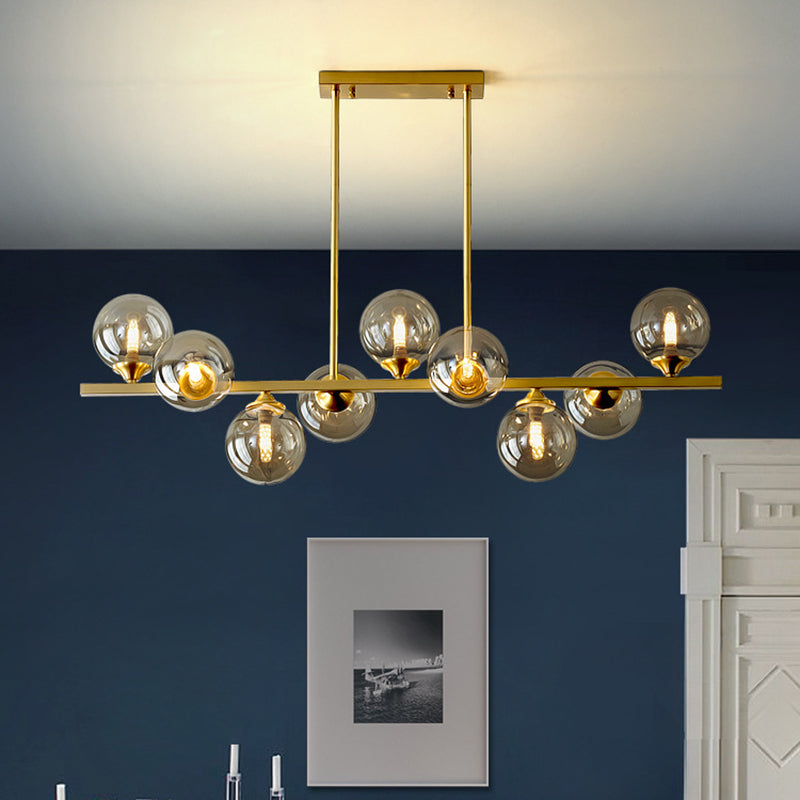 Mid-Century Modern Gold Metal Island Pendant Lighting Spherical Amber Glass Island Ceiling Light for Dining Table Clearhalo 'Ceiling Lights' 'Island Lights' 'Lighting' 2605085