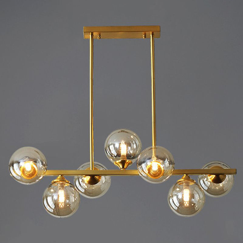 Mid-Century Modern Gold Metal Island Pendant Lighting Spherical Amber Glass Island Ceiling Light for Dining Table 7 Gold Clearhalo 'Ceiling Lights' 'Island Lights' 'Lighting' 2605086