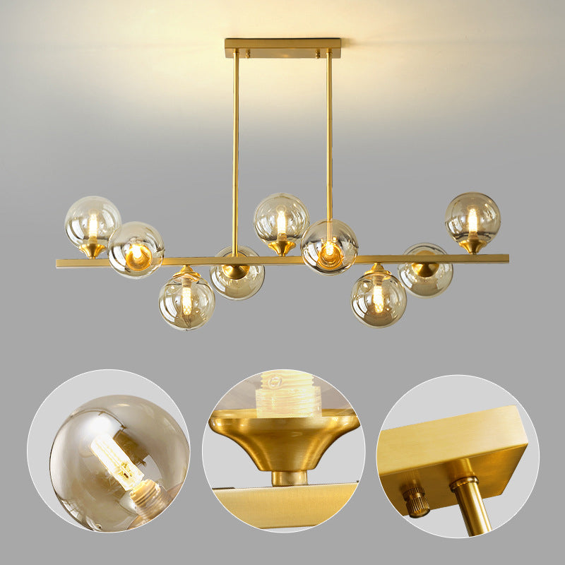 Mid-Century Modern Gold Metal Island Pendant Lighting Spherical Amber Glass Island Ceiling Light for Dining Table Clearhalo 'Ceiling Lights' 'Island Lights' 'Lighting' 2605089
