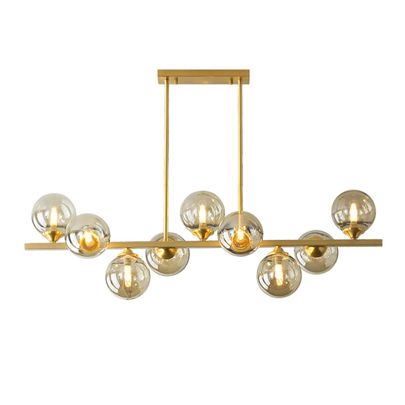 Mid-Century Modern Gold Metal Island Pendant Lighting Spherical Amber Glass Island Ceiling Light for Dining Table Clearhalo 'Ceiling Lights' 'Island Lights' 'Lighting' 2605091