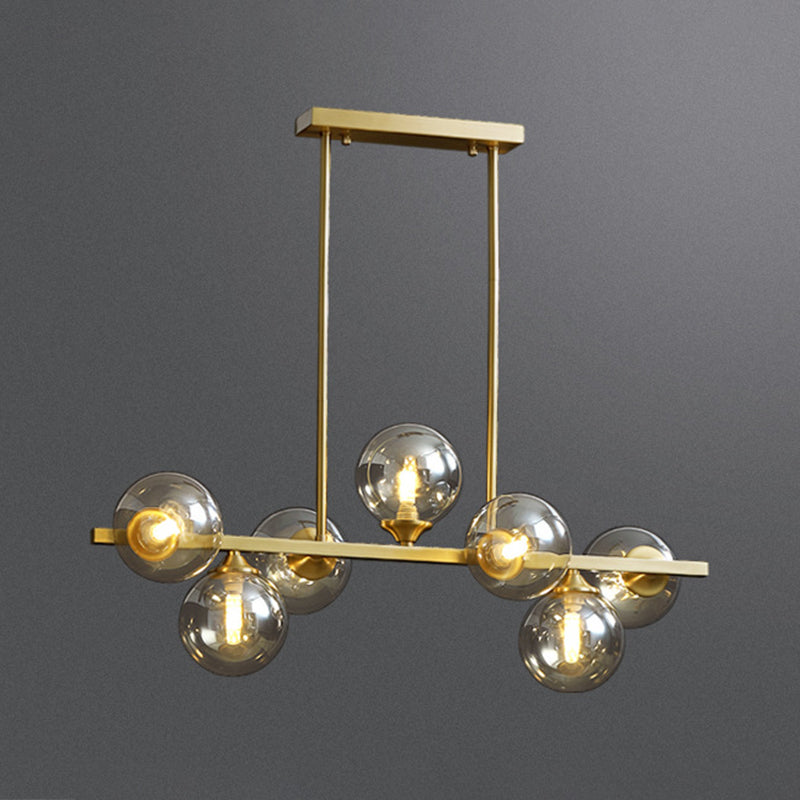 Mid-Century Modern Gold Metal Island Pendant Lighting Spherical Amber Glass Island Ceiling Light for Dining Table Clearhalo 'Ceiling Lights' 'Island Lights' 'Lighting' 2605093
