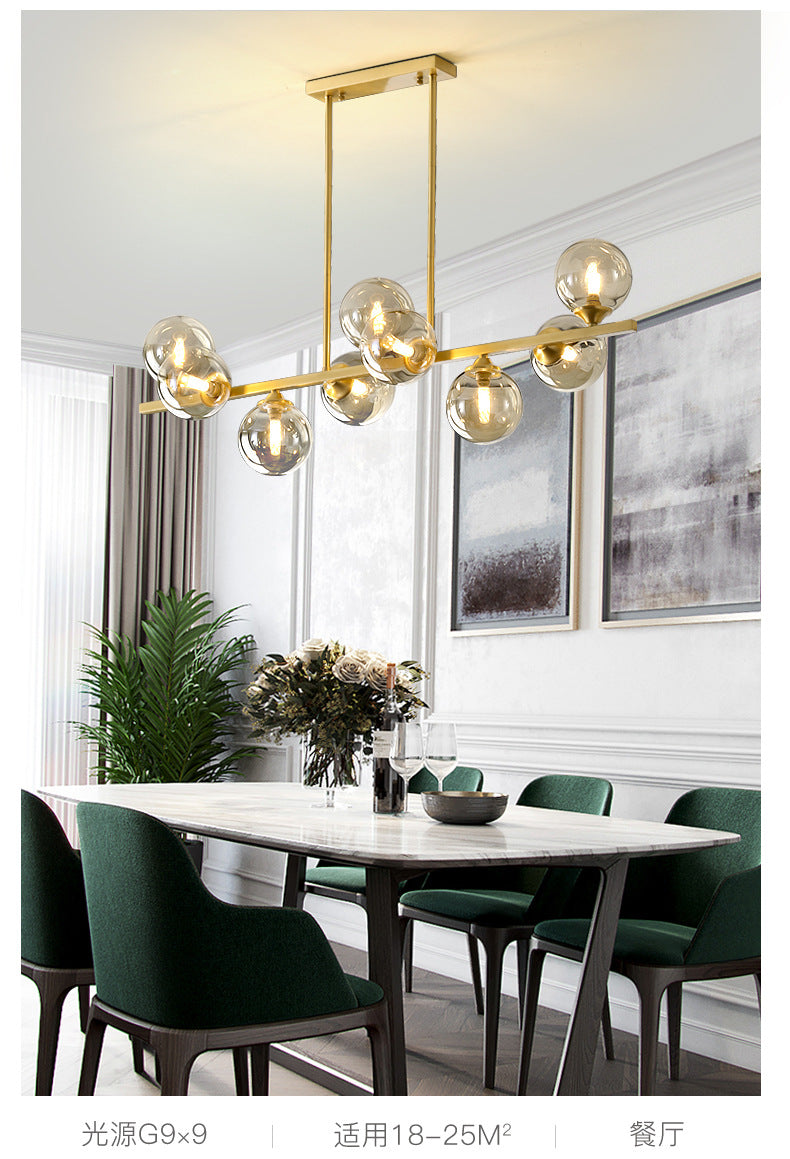 Mid-Century Modern Gold Metal Island Pendant Lighting Spherical Amber Glass Island Ceiling Light for Dining Table Clearhalo 'Ceiling Lights' 'Island Lights' 'Lighting' 2605097