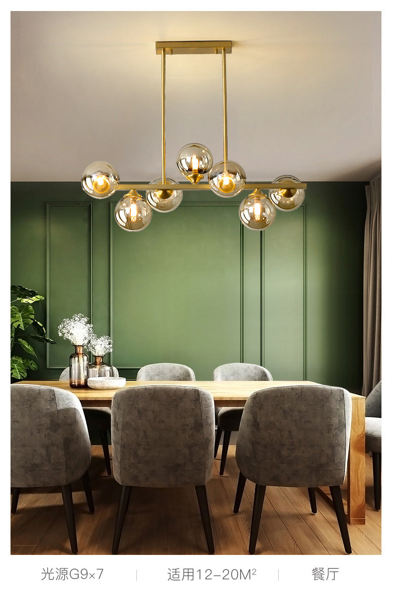 Mid-Century Modern Gold Metal Island Pendant Lighting Spherical Amber Glass Island Ceiling Light for Dining Table Clearhalo 'Ceiling Lights' 'Island Lights' 'Lighting' 2605098