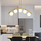 Mid-Century Modern Gold Metal Island Pendant Lighting Spherical Glass Island Ceiling Light for Dining Table Clearhalo 'Ceiling Lights' 'Island Lights' 'Lighting' 2605248