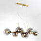 8 Light Mid-Century Gold Metal Island Pendant Lighting Spherical Glass Island Ceiling Light for Dining Table Clearhalo 'Ceiling Lights' 'Island Lights' 'Lighting' 2605250