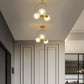 Post-Modern Metal Hanging Chandelier Light Globe Glass Shade Ceiling Chandelier in Gold for Bedroom Clearhalo 'Ceiling Lights' 'Chandeliers' Lighting' 2605454