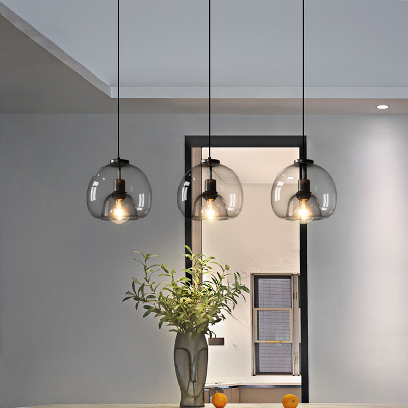 Black Spherical Pendant Light Modern Minimalist Clear Glass Dining Room Hanging Lamp Clearhalo 'Ceiling Lights' 'Pendant Lights' 'Pendants' Lighting' 2610135