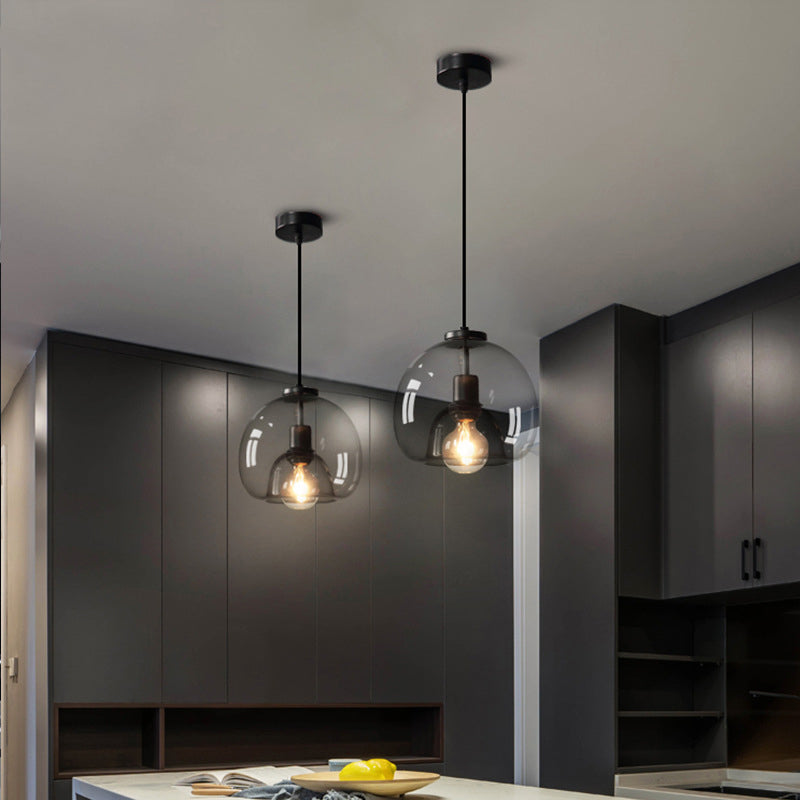 Black Spherical Pendant Light Modern Minimalist Clear Glass Dining Room Hanging Lamp Clearhalo 'Ceiling Lights' 'Pendant Lights' 'Pendants' Lighting' 2610137