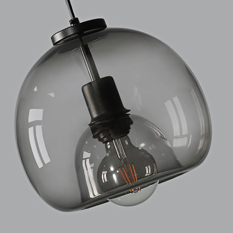 Black Spherical Pendant Light Modern Minimalist Clear Glass Dining Room Hanging Lamp Clearhalo 'Ceiling Lights' 'Pendant Lights' 'Pendants' Lighting' 2610144