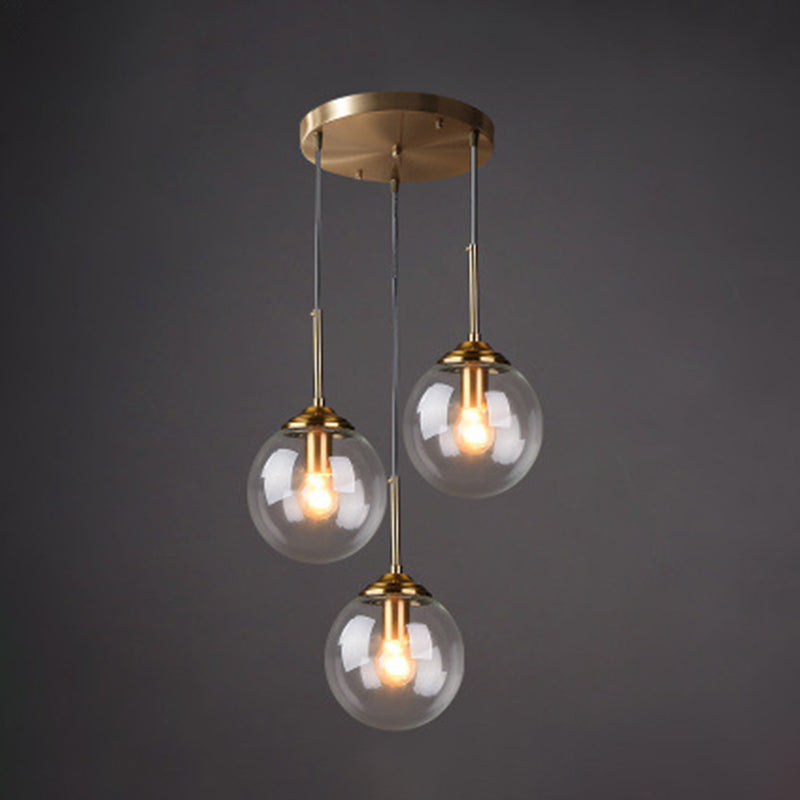 3 Lights Globe Hanging Ceiling Lights Minimalist Glass Multi Light Pendant for Restaurant Clear Round Clearhalo 'Ceiling Lights' 'Pendant Lights' 'Pendants' Lighting' 2630010_ec89fb82-2981-425e-b9e2-9fa56d415bdb