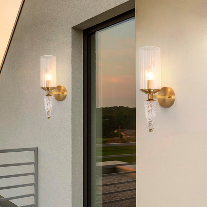 Indoor Wall Light Fixture with Cylindrical Clear Glass Shade Mid Century 1 Head Wall Sconce in Brass Clearhalo 'Wall Lamps & Sconces' 'Wall Lights' Lighting' 265585