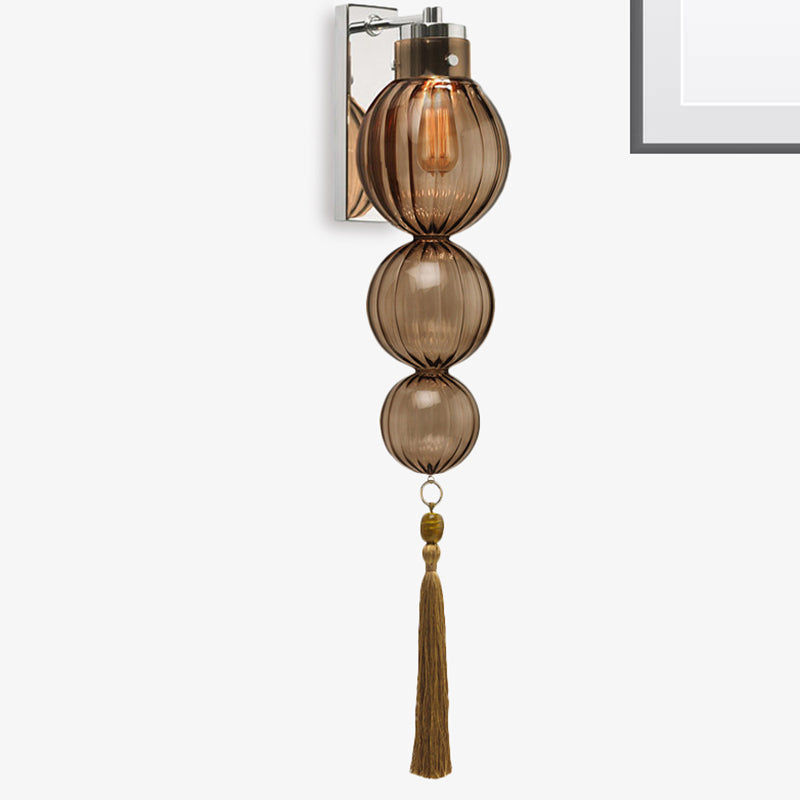 Brass/Chrome Finish Sphere Sconce Light Chinese Style 1 Bulb Clear/Amber/Light Blue Glass Wall Mount Lamp with Tassel Knot Clearhalo 'Cast Iron' 'Glass' 'Industrial' 'Modern wall lights' 'Modern' 'Tiffany' 'Traditional wall lights' 'Wall Lamps & Sconces' 'Wall Lights' Lighting' 273070
