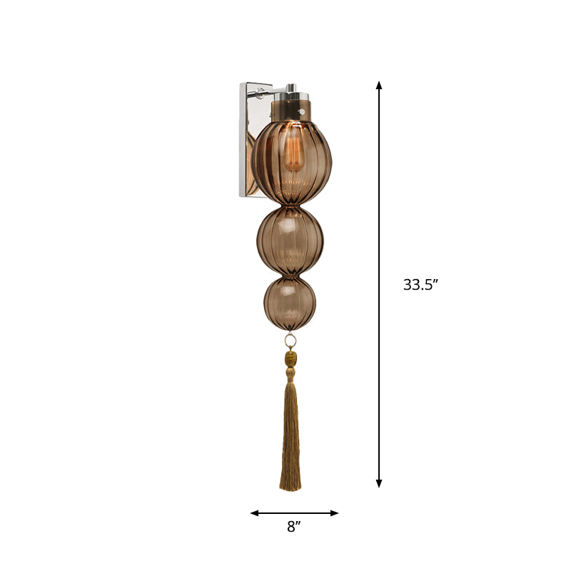 Brass/Chrome Finish Sphere Sconce Light Chinese Style 1 Bulb Clear/Amber/Light Blue Glass Wall Mount Lamp with Tassel Knot Clearhalo 'Cast Iron' 'Glass' 'Industrial' 'Modern wall lights' 'Modern' 'Tiffany' 'Traditional wall lights' 'Wall Lamps & Sconces' 'Wall Lights' Lighting' 273073