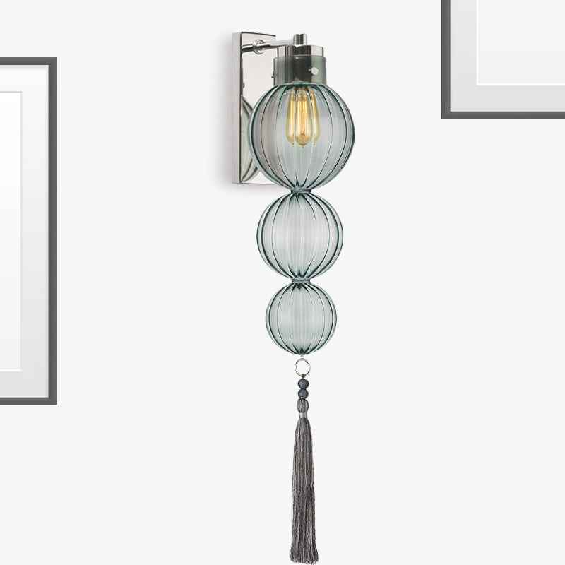 Brass/Chrome Finish Sphere Sconce Light Chinese Style 1 Bulb Clear/Amber/Light Blue Glass Wall Mount Lamp with Tassel Knot Chrome Light Blue Clearhalo 'Cast Iron' 'Glass' 'Industrial' 'Modern wall lights' 'Modern' 'Tiffany' 'Traditional wall lights' 'Wall Lamps & Sconces' 'Wall Lights' Lighting' 273079