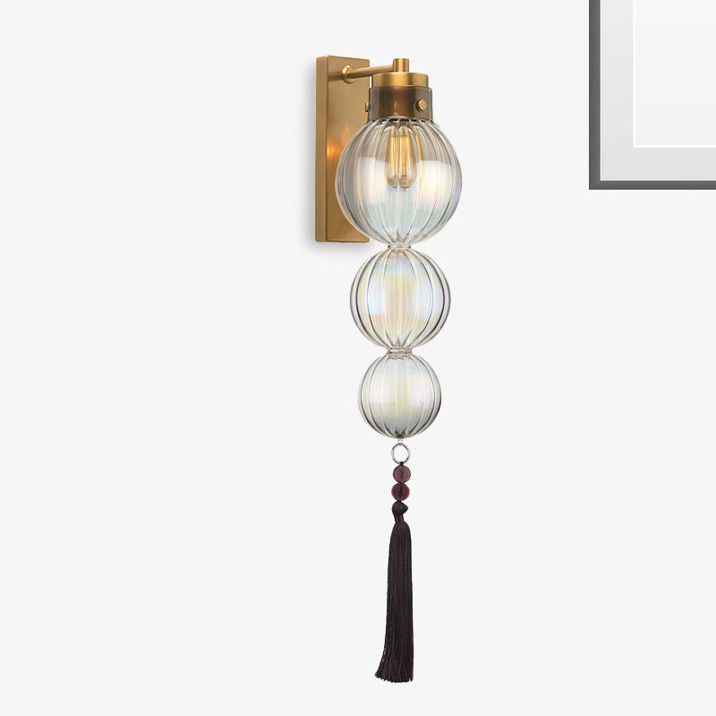Brass/Chrome Finish Sphere Sconce Light Chinese Style 1 Bulb Clear/Amber/Light Blue Glass Wall Mount Lamp with Tassel Knot Brass Clear Clearhalo 'Cast Iron' 'Glass' 'Industrial' 'Modern wall lights' 'Modern' 'Tiffany' 'Traditional wall lights' 'Wall Lamps & Sconces' 'Wall Lights' Lighting' 273084