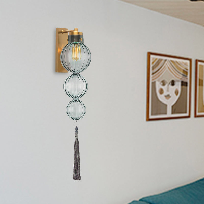 Brass/Chrome Finish Sphere Sconce Light Chinese Style 1 Bulb Clear/Amber/Light Blue Glass Wall Mount Lamp with Tassel Knot Clearhalo 'Cast Iron' 'Glass' 'Industrial' 'Modern wall lights' 'Modern' 'Tiffany' 'Traditional wall lights' 'Wall Lamps & Sconces' 'Wall Lights' Lighting' 273090