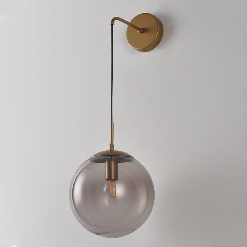 Clear/Smoke Grey Glass Sphere Wall Sconce Retro 1 Light Wall Mount Lamp with Long Gold/Black Arm - Clearhalo - 'Cast Iron' - 'Glass' - 'Industrial' - 'Modern wall lights' - 'Modern' - 'Tiffany' - 'Traditional wall lights' - 'Wall Lamps & Sconces' - 'Wall Lights' - Lighting' - 273157