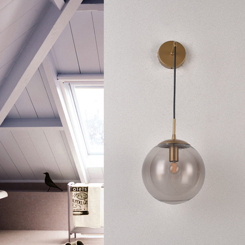 Clear/Smoke Grey Glass Sphere Wall Sconce Retro 1 Light Wall Mount Lamp with Long Gold/Black Arm - Clearhalo - 'Cast Iron' - 'Glass' - 'Industrial' - 'Modern wall lights' - 'Modern' - 'Tiffany' - 'Traditional wall lights' - 'Wall Lamps & Sconces' - 'Wall Lights' - Lighting' - 273158