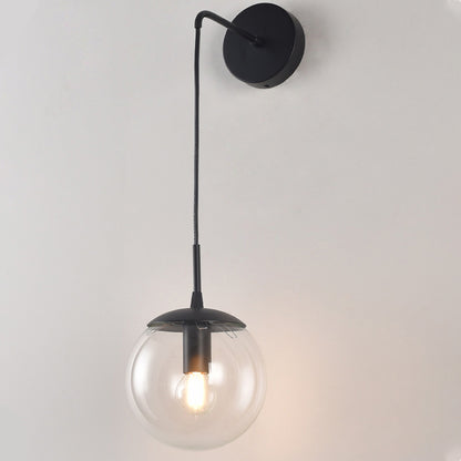 Clear/Smoke Grey Glass Sphere Wall Sconce Retro 1 Light Wall Mount Lamp with Long Gold/Black Arm Black Clearhalo 'Cast Iron' 'Glass' 'Industrial' 'Modern wall lights' 'Modern' 'Tiffany' 'Traditional wall lights' 'Wall Lamps & Sconces' 'Wall Lights' Lighting' 273162