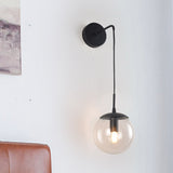 Clear/Smoke Grey Glass Sphere Wall Sconce Retro 1 Light Wall Mount Lamp with Long Gold/Black Arm - Clearhalo - 'Cast Iron' - 'Glass' - 'Industrial' - 'Modern wall lights' - 'Modern' - 'Tiffany' - 'Traditional wall lights' - 'Wall Lamps & Sconces' - 'Wall Lights' - Lighting' - 273163