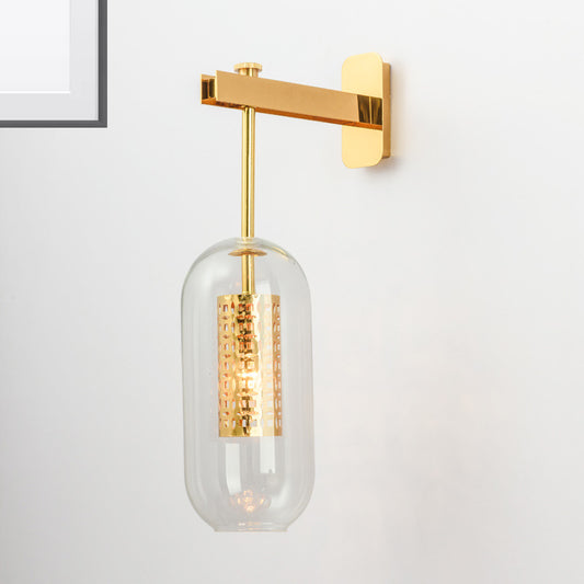 Clear Glass Tube Sconce Light Contemporary 1 Light Brass Bedroom Wall Mount Lamp Clearhalo 'Cast Iron' 'Glass' 'Industrial' 'Modern wall lights' 'Modern' 'Tiffany' 'Traditional wall lights' 'Wall Lamps & Sconces' 'Wall Lights' Lighting' 273181