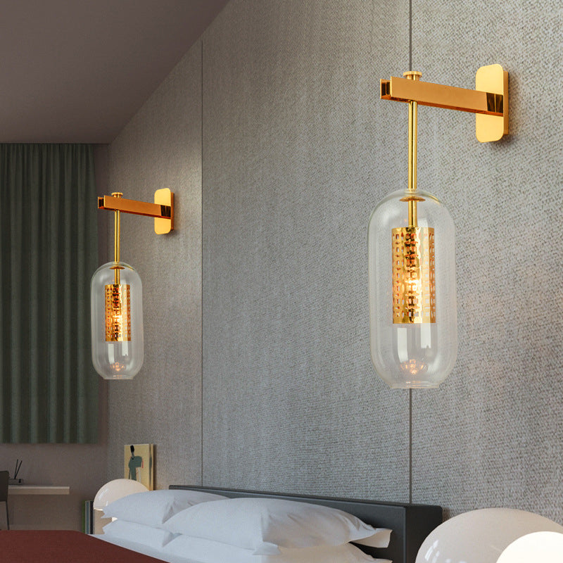 Clear Glass Tube Sconce Light Contemporary 1 Light Brass Bedroom Wall Mount Lamp - Clearhalo - 'Cast Iron' - 'Glass' - 'Industrial' - 'Modern wall lights' - 'Modern' - 'Tiffany' - 'Traditional wall lights' - 'Wall Lamps & Sconces' - 'Wall Lights' - Lighting' - 273182