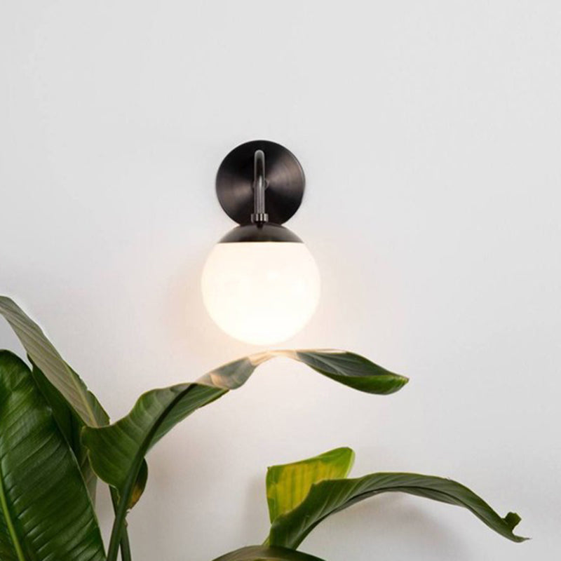 1 Bulb Bedside Sconce Light Minimalist Golden/Black Wall Lamp with Milky Glass Ball Shade Clearhalo 'Cast Iron' 'Glass' 'Industrial' 'Modern wall lights' 'Modern' 'Tiffany' 'Traditional wall lights' 'Wall Lamps & Sconces' 'Wall Lights' Lighting' 273230