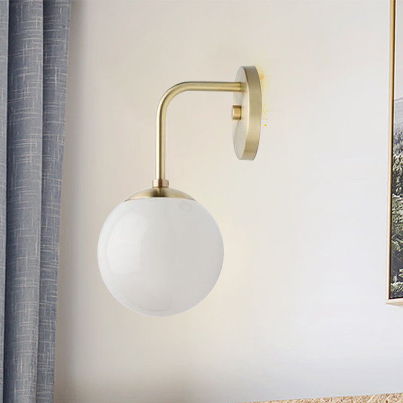 1 Bulb Bedside Sconce Light Minimalist Golden/Black Wall Lamp with Milky Glass Ball Shade Clearhalo 'Cast Iron' 'Glass' 'Industrial' 'Modern wall lights' 'Modern' 'Tiffany' 'Traditional wall lights' 'Wall Lamps & Sconces' 'Wall Lights' Lighting' 273235