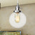 Orbit Hanging Lighting Farmhouse Amber/Clear Glass 1 Bulb Pendant Light Fixture with Adjustable Cord in Black/Bronze/Brass Finish Chrome Clear Clearhalo 'Art Deco Pendants' 'Black' 'Cast Iron' 'Ceiling Lights' 'Ceramic' 'Crystal' 'Industrial Pendants' 'Industrial' 'Metal' 'Middle Century Pendants' 'Pendant Lights' 'Pendants' 'Rustic Pendants' 'Tiffany' Lighting' 273895