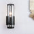 1 Bulb Black Wall Sconce Modern Style Clear Cylindrical Glass Wall Mounted Lamp Black Clearhalo 'Cast Iron' 'Glass' 'Industrial' 'Modern wall lights' 'Modern' 'Tiffany' 'Traditional wall lights' 'Wall Lamps & Sconces' 'Wall Lights' Lighting' 275058