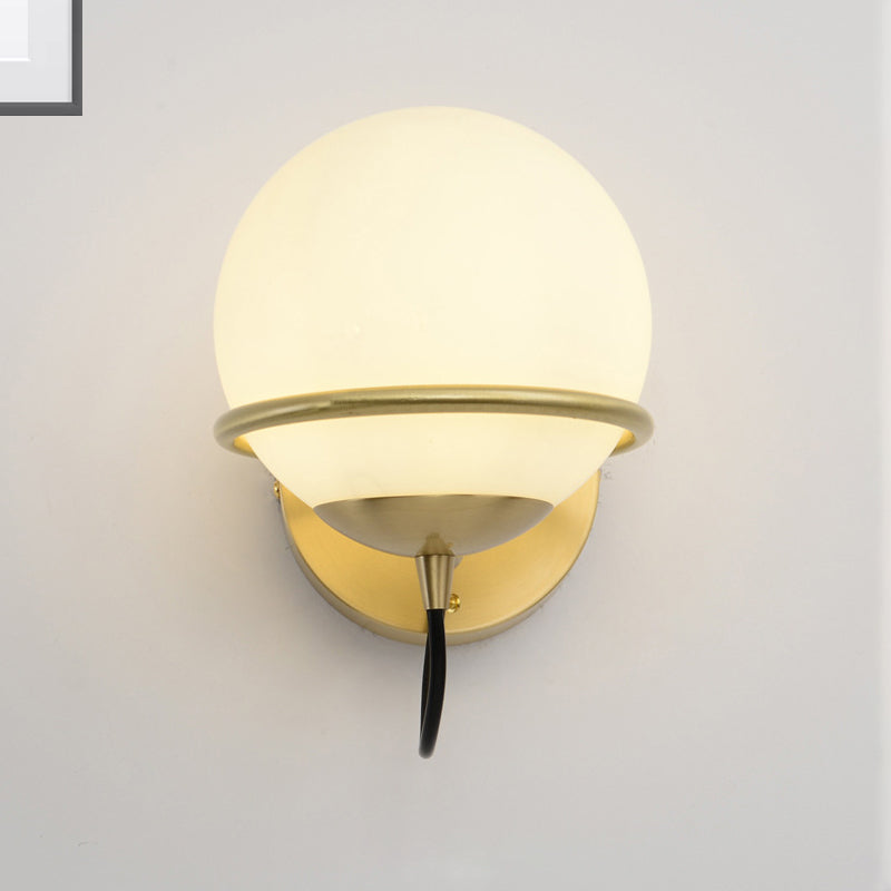 Single Wall Mount Spherical Sconce Light Contemporary Matte White Glass Brass Wall Light Fixture Clearhalo 'Cast Iron' 'Glass' 'Industrial' 'Modern wall lights' 'Modern' 'Tiffany' 'Traditional wall lights' 'Wall Lamps & Sconces' 'Wall Lights' Lighting' 275107